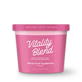 Pink container of 'Vitality Blend' whole food supplement for dogs on a white background