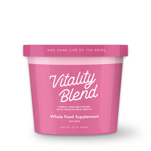 Pink container of 'Vitality Blend' whole food supplement for dogs on a white background