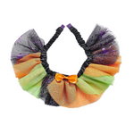 Halloween-themed headband with colorful ribbons and a bow on a white background