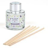 Pet House reed diffuser with wooden sticks on a white background