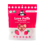 Package of Love Puffs Sweet Beat dog treats with pink and white design