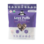 Package of Love Puffs Wild Berries dog treats on a white background