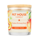 Pet House Candle with mango peach flavor on a white background