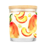 Candle with peach design on a white background