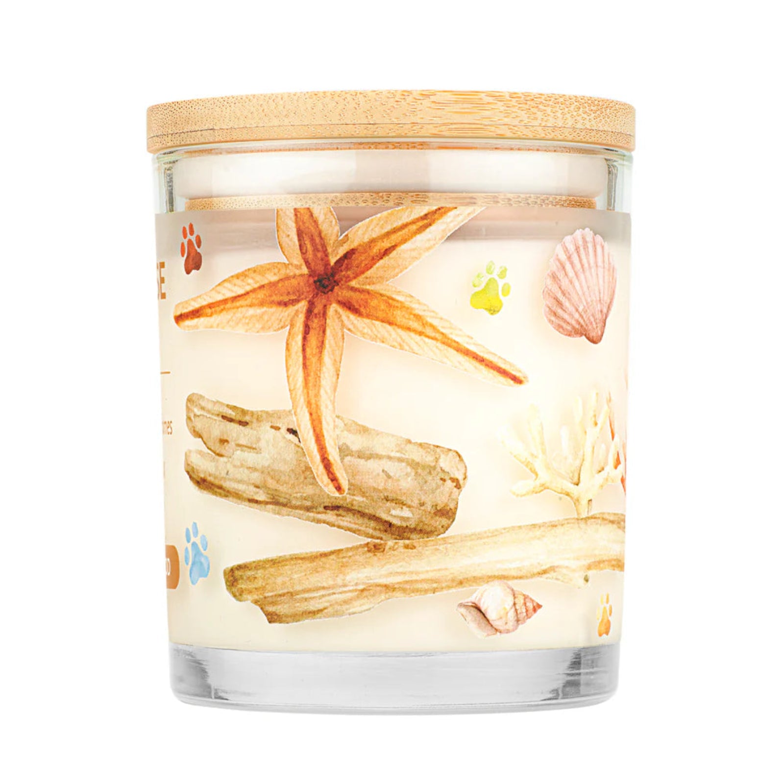 Candle with beach-themed design featuring starfish, driftwood, and shells on a white background.