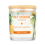 Pet Candle with tropical design featuring palm trees, pineapples, and paw prints on a white background.