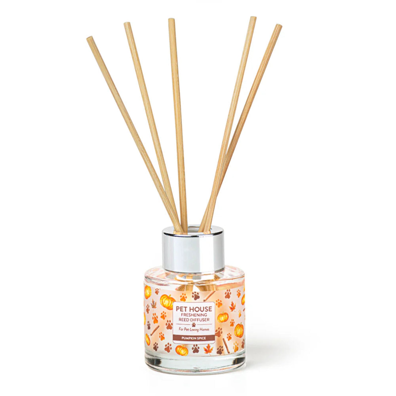 Reed diffuser with wooden sticks and a clear bottle on a white background