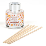 Pet House reed diffuser with wooden sticks on a white background