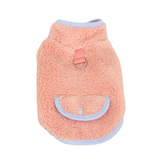 Pink fleece dog sweater with a pocket on a white background