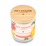 Pet House Candle with ruby red grapefruit flavor on a white background