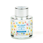 Pet House Freshening Reed Diffuser with colorful label on a white background
