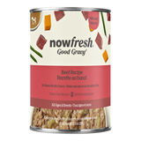 A can of Now Fresh Good Gravy Beef Recipe dog food, showing the front label with illustrations of beef, green beans, and carrots on a cream background, with the wet food visible through a clear lower section.