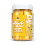 A clear plastic jar of WERUVA Puddy Pops! Chicken & Pumpkin lickable cat treats, filled with yellow individually wrapped treats and topped with a white screw cap, shown on a white background.