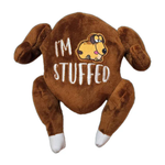 Plush toy shaped like a roasted turkey with 'I'm Stuffed' text and cartoon dog on a white background