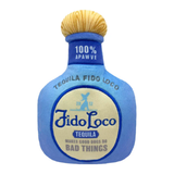 Blue tequila bottle shaped like a dog with 'Fido Loco' branding on a white background