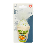 Cat toy packaging with a cup-shaped item and catnip, featuring the brand 'Hush & Hiss'.