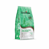 A bag of FirstMate Grain Free Duck Meal & Oats Formula dog food, featuring a green and white packaging design with a silhouette of a dog on a green background.