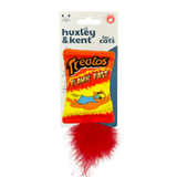 Cat toy with red feather on a Huxley & Kent branded card