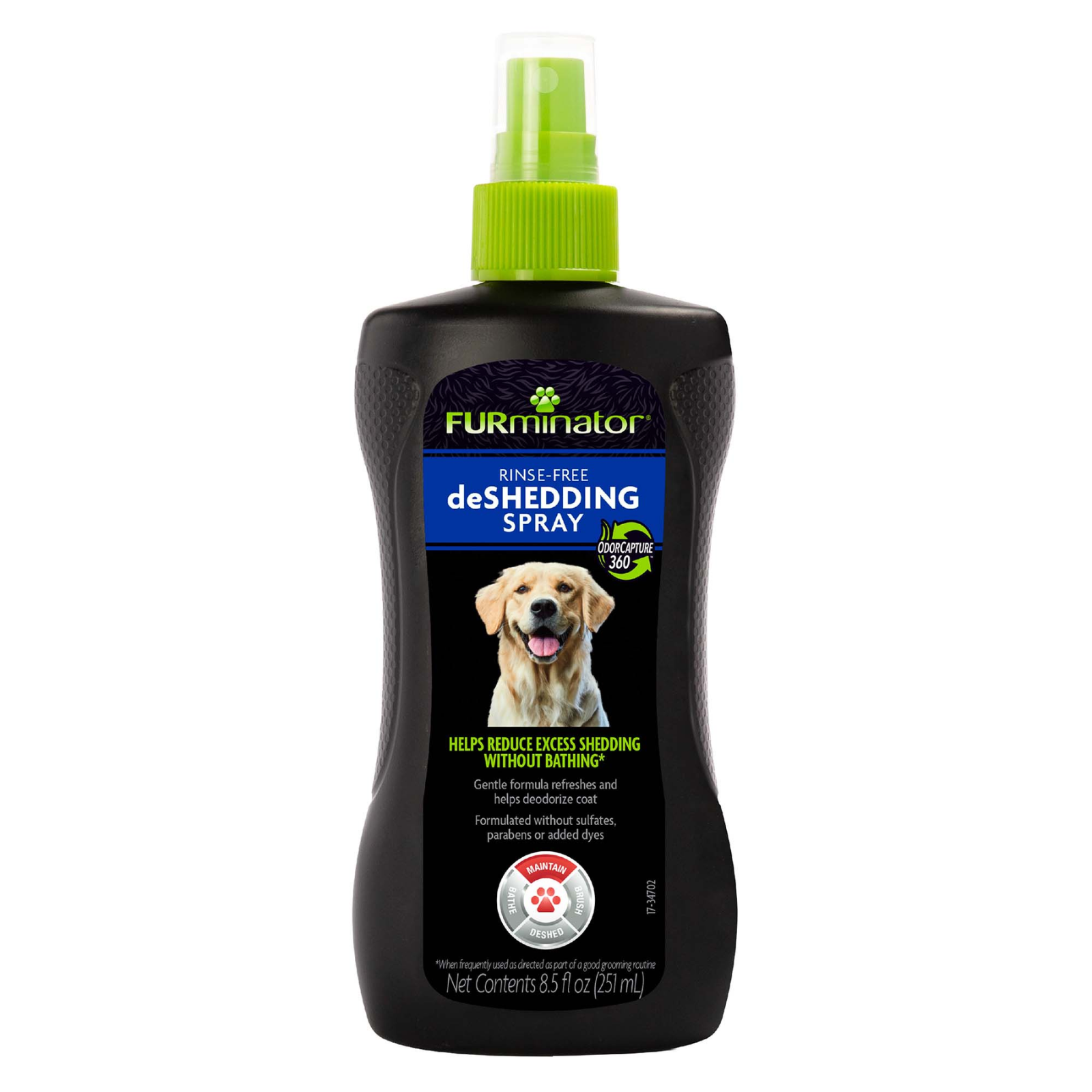 A bottle of Furminator Rinse Free Shedding Spray for dogs, featuring a black bottle with a bright green spray nozzle and a label showing a yellow Labrador retriever.