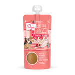 Pink pouch of Weruva's 'Dogs in the Kitchen' series on a white background