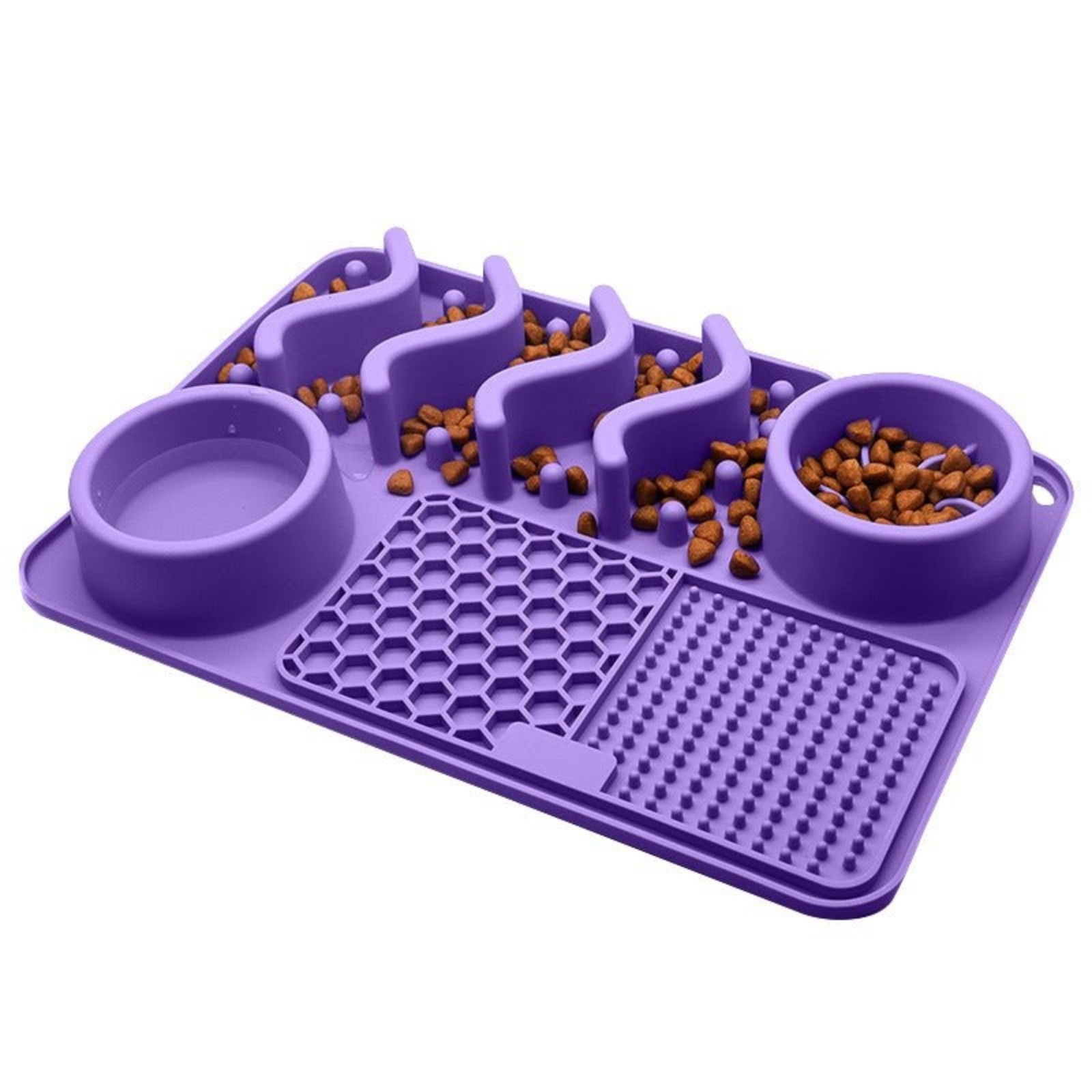 A purple slow feeder pet plate with integrated bowls, textured grids, and a divided tray with scattered kibble, shown on a plain white background.