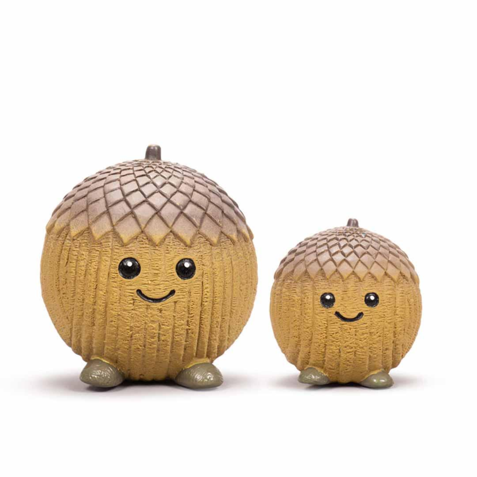 Two cute smiling acorn figurines in different sizes, standing on a white background.
