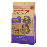 A bag of Carna 4 Synthetic-Free dog food, featuring a kraft paper design with a purple bottom section and an illustration of a woman holding a dog, on a white background.