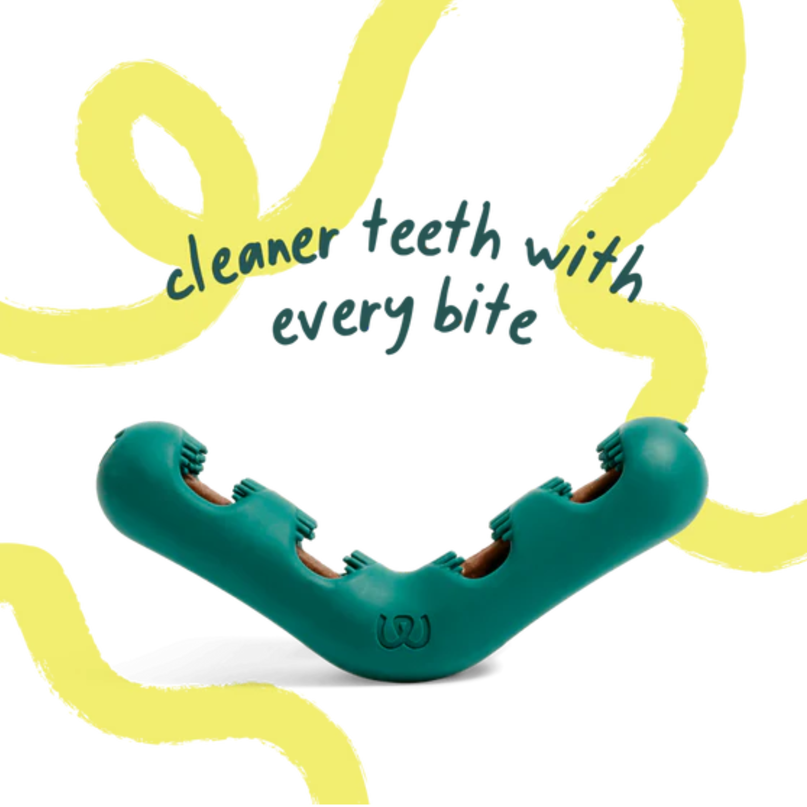 A teal dog chew toy with a curved, V-shaped design and textured teeth inside, displayed on a white background with yellow abstract brush strokes and the text 'cleaner teeth with every bite'.