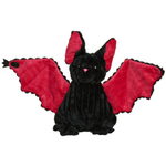 A plush toy bat with black fur and bright red wings, photographed against a plain white background.