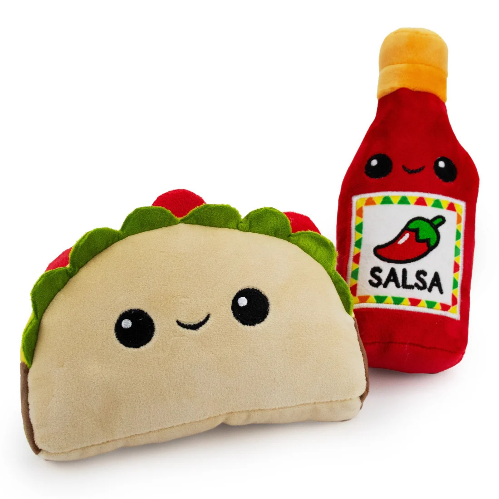 A plush toy set featuring a cute smiling taco pillow in the foreground and a red salsa bottle plush in the background, both with embroidered facial features on a plain white studio background.