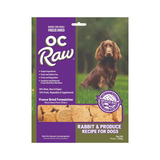 A package of OC Raw Freeze Dried Recipe for Dogs, specifically Rabbit & Produce flavor, in a 14 oz bag. The packaging features a purple and green design with a photo of a brown rabbit on the front.