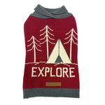 A knit pet sweater in burgundy and gray, featuring a cream-colored camping tent and pine tree graphic with the word 'EXPLORE' knitted across the front.