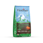 A bag of FirstMate dog food, specifically Duck Pumpkin, shown on a clean white background. The packaging features a blue and green design with an illustration of a family and a dog, and a pumpkin graphic.