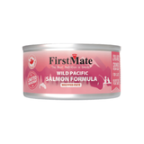 A can of First Mate Wild Pacific Salmon Formula wet cat food, featuring a pink label with white text and silhouettes of mountains and a fisherman, on a solid white background.