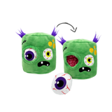 A green plush monster toy shown in two states: closed on the left and open on the right, with a black arrow between them indicating a flip-open action. A white eyeball accessory is placed in front on a plain white background.