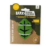 Bark Super Chewer dog chew toy in a green leaf shape, packaged on a brown and camouflage cardboard backing with branding and product details.