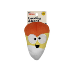 A huxley & kent brand plush dog toy shaped like a candy corn, featuring orange, yellow, and white sections with embroidered eyes and a black nose, shown on its original cardboard hanger against a white background.