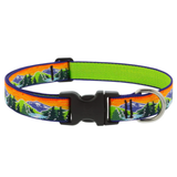 A pet collar with a vibrant landscape print featuring mountains, pine trees, and an orange sunset sky, with a bright lime green inner band and a black plastic buckle.