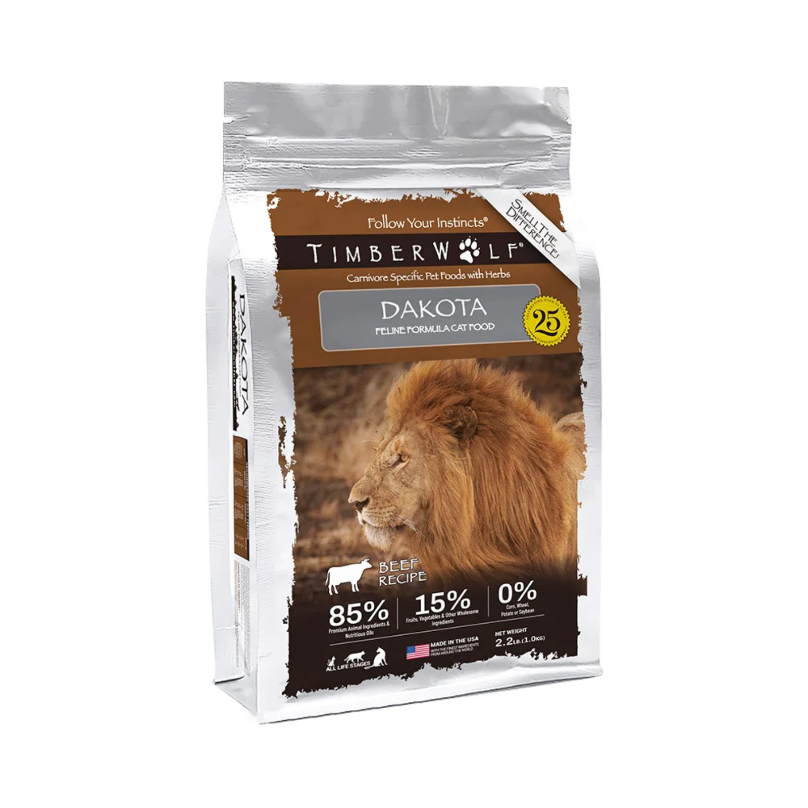 A bag of Timber Wolf Dakota pet food, formulated for cats. The packaging is white and brown with a large photo of a male lion on the front, and features product details like 85% animal protein and 15% fruits and vegetables.