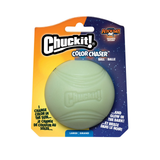 Chuckit! Color Chaser Ball dog toy in its original blister packaging, featuring a light green ball that changes color in the sun and glows in the dark.