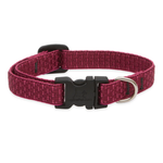 Red dog collar with a black buckle on a white background