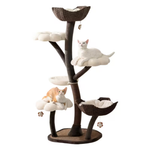 A multi-level cat tree with a dark brown faux-wood trunk and branches, cream plush cloud perches, woven wicker bowls, and hanging toys, shown with two cats resting on the levels against a plain white background.