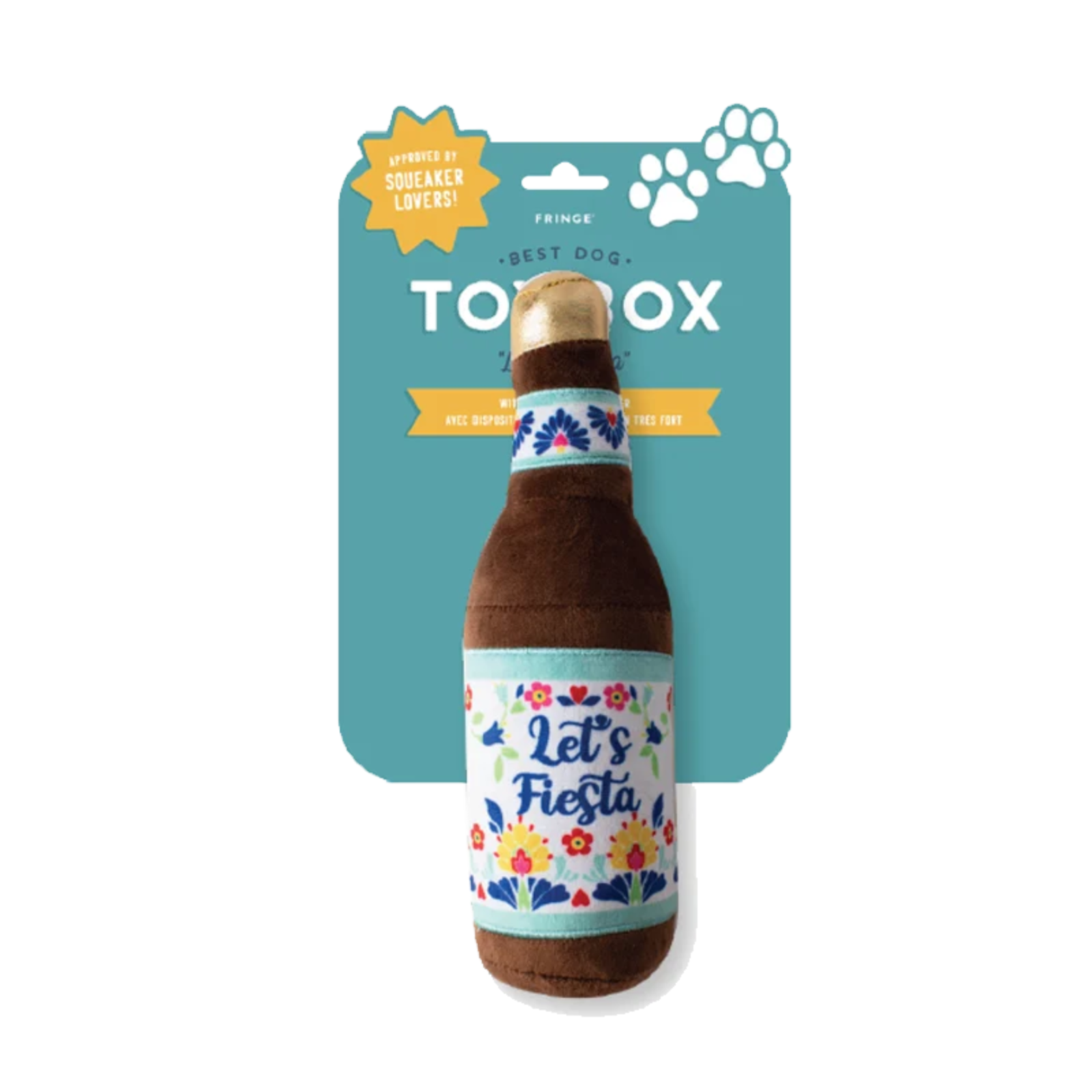 A plush dog toy shaped like a beer bottle, hanging from its teal retail card packaging. The toy is brown with a floral label that reads 'Let's Fiesta' and a gold-colored top cap.