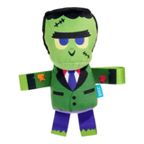 A plush toy dog dressed as Frankenstein's monster, featuring a green face and suit, purple pants, and black hair, shown on a plain white background.