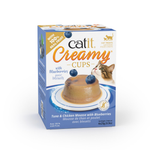 Catit Creamy Cups Tuna & Chicken Mousse with Blueberries cat treat box, featuring a blue and white design with an illustration of a cat and a serving of mousse on a plate.
