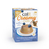 Catit Creamy Cups Tuna & Chicken Mousse with Blueberries cat treat box, featuring a blue and white design with an illustration of a cat and a serving of mousse on a plate.