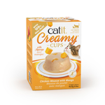 A box of Catit Creamy Cups cat treats, specifically Chicken Mousse with Mango, shown on a clean white background. The packaging is orange and white with a photo of a cat and a serving suggestion of the creamy mousse.