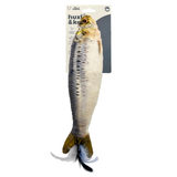 Fish-shaped toy with packaging on a white background