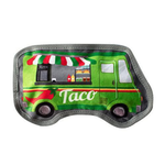 A green plush dog toy shaped like a taco truck, featuring the word 'Taco' in white script, a red and white striped awning, and a gray fabric border.