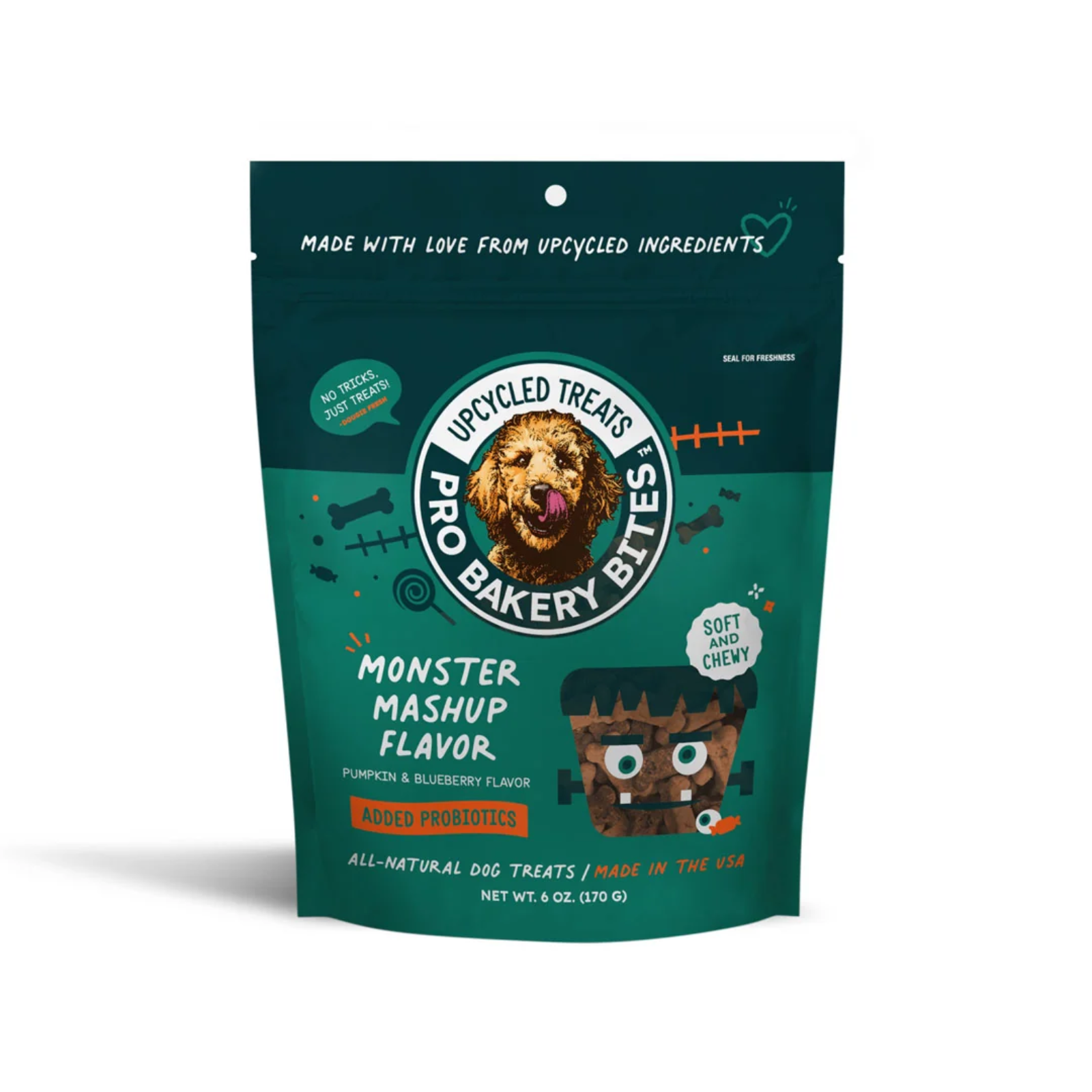 A stand-up pouch of Upcycled Treats Pro Bakery Bites dog treats in Monster Mashup flavor, shown on a plain white background. The packaging is dark teal with white text and graphics, featuring a dog illustration and a cartoon monster face.